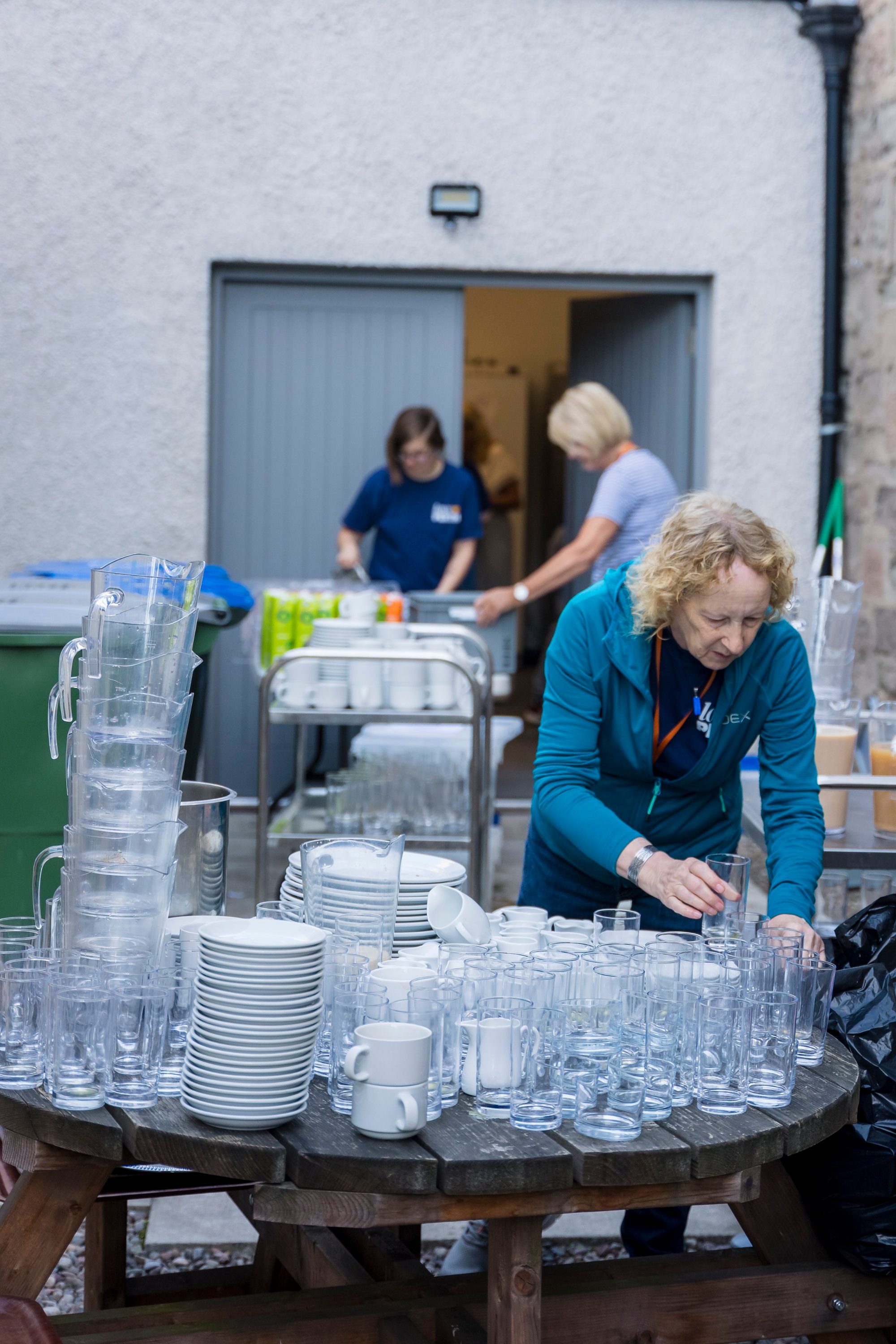 Volunteers preparing food together at a community meal, Perth Trinity